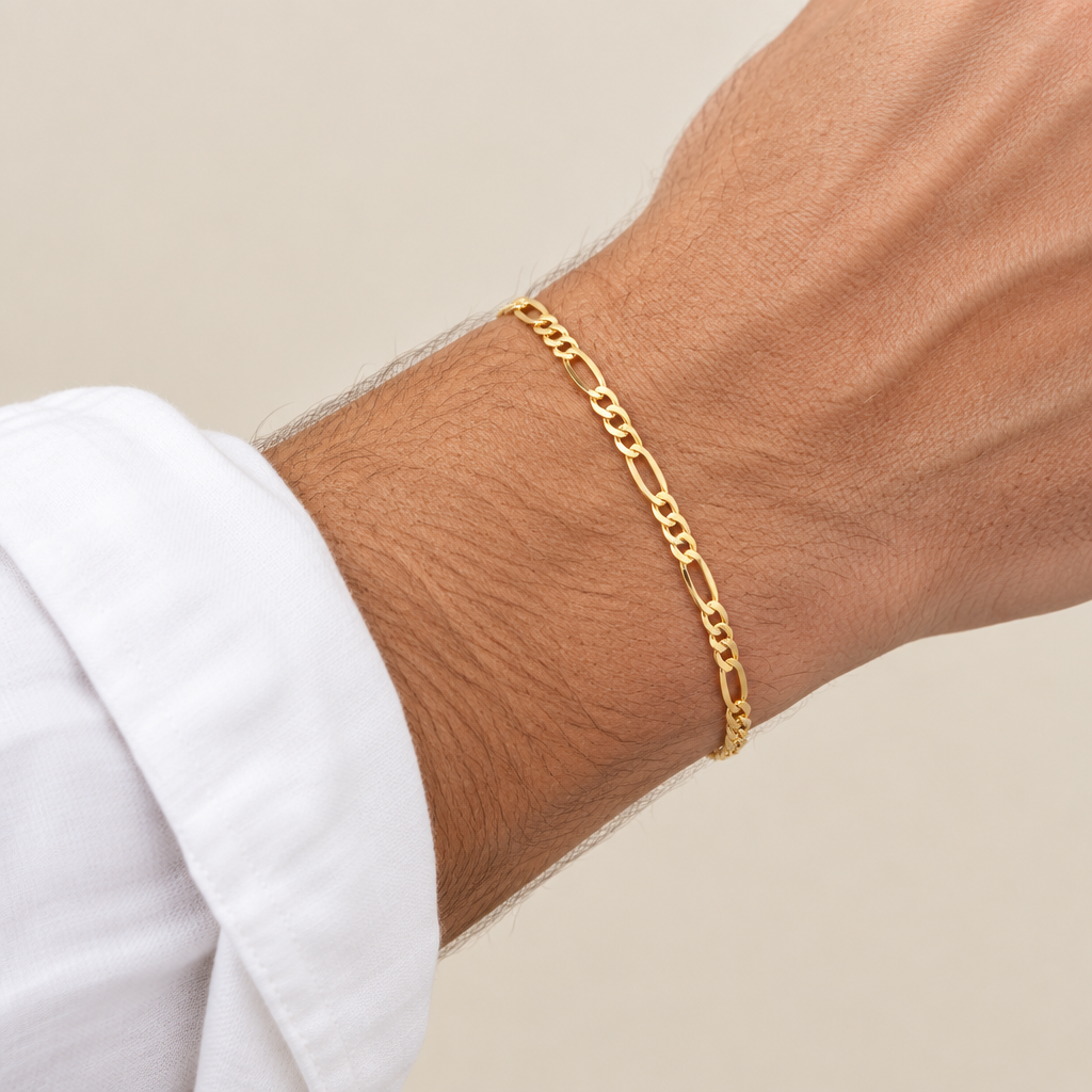Bracciale figaro 3+1 vuoto oro giallo 18kt 4mm 20cm indossato