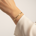 Bracciale piattina pieno oro giallo 18kt 2mm 19cm indossato