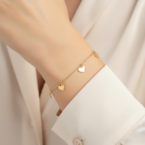 Bracciale 5 cuori pendenti oro giallo 18kt 16-18cm indossato, dettaglio