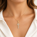 Croce microfusa con zirconi oro bianco e giallo 18kt 1,3x2,3cm indossato